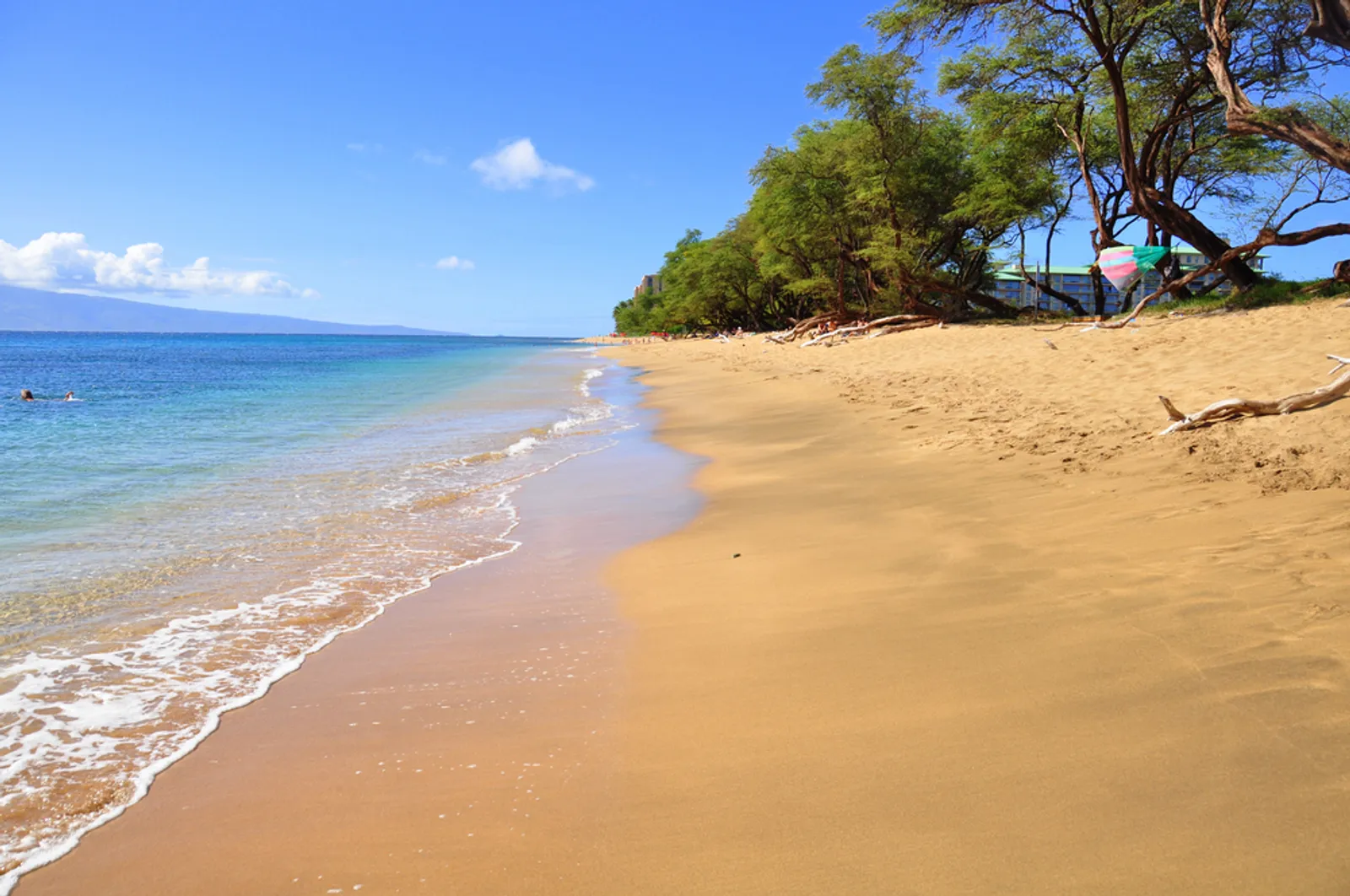Pristine Polihua Beach with turquoise waters and Molokaʻi in distance