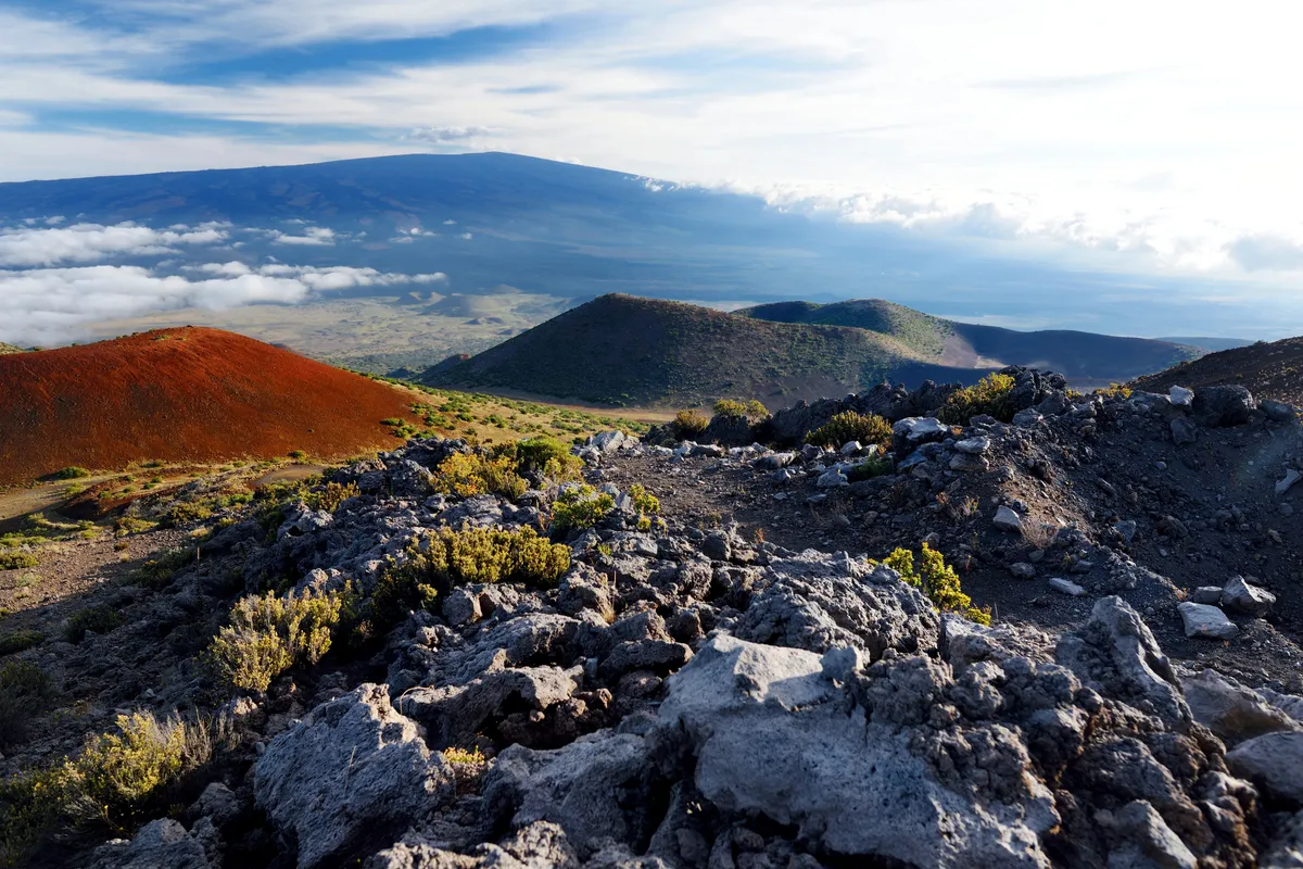 Mauna Loa volcanic landscape with rocky terrain and dramatic mountain views