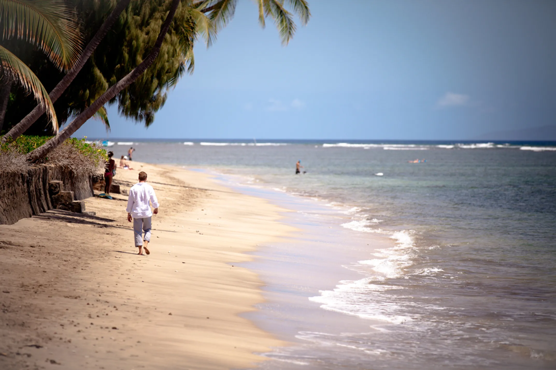 Maui's pristine beaches with golden sand and turquoise waters