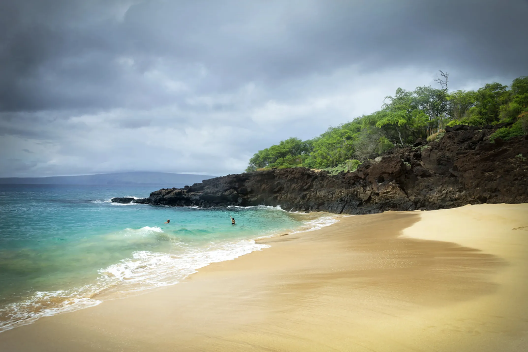 Beautiful Maui beach with golden sand and turquoise water