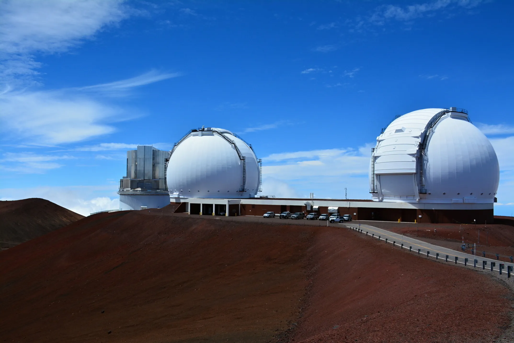 Maunakea sacred mountain with snow-capped summit and observatories