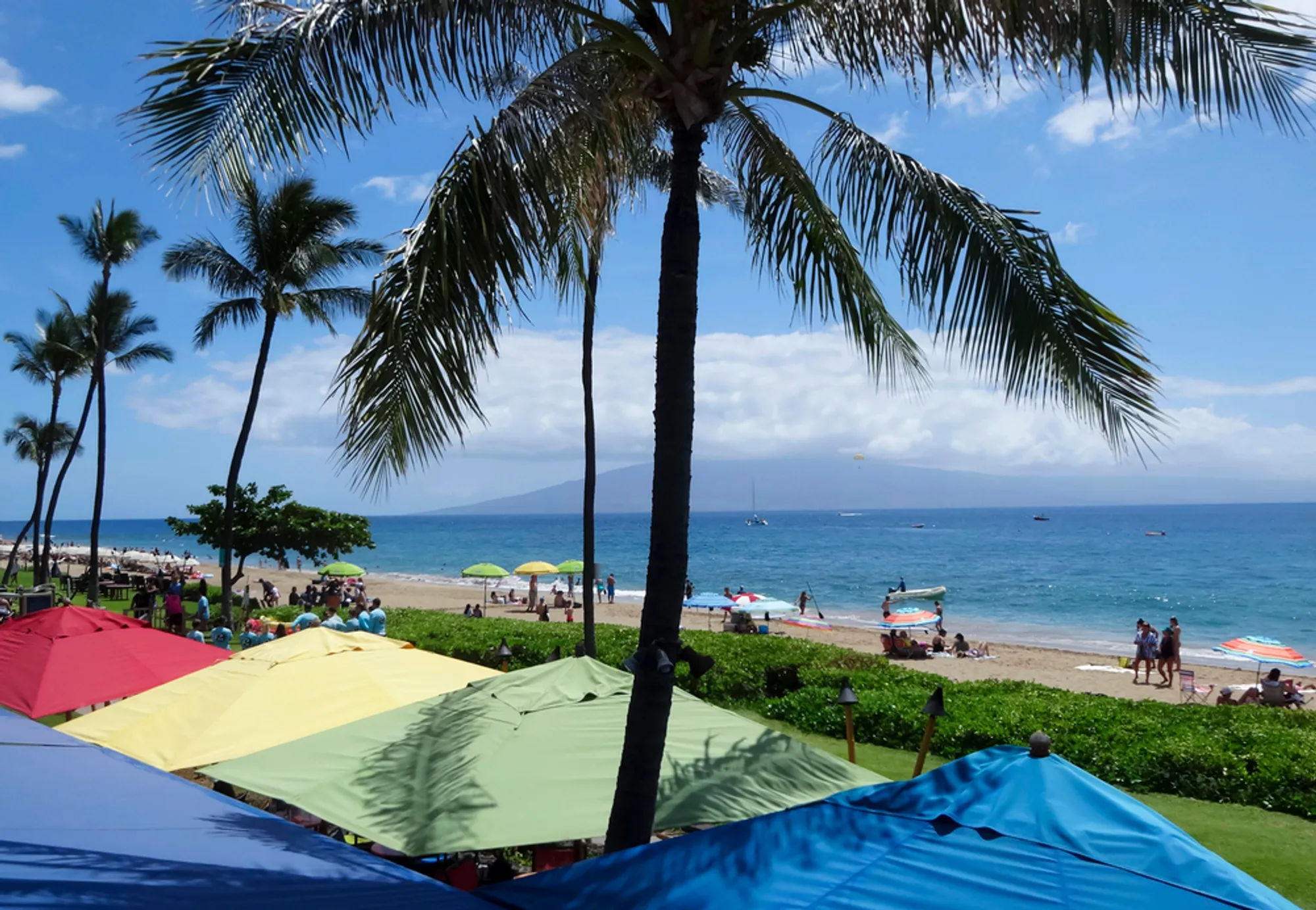 Couple enjoying romantic sunset beach walk on Lanai