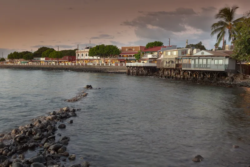 West Maui Mountains and coastline during golden hour showing the natural beauty of the region