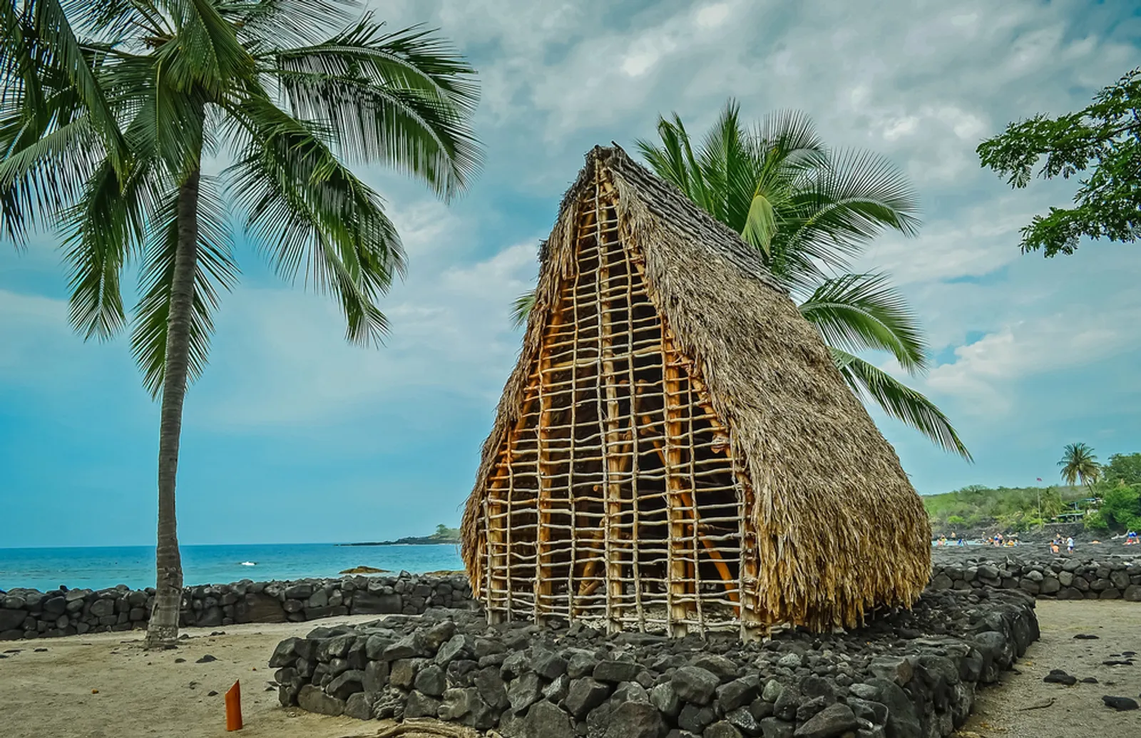 Aerial view of ancient Hawaiian heiau temple on Kauai with lush valley