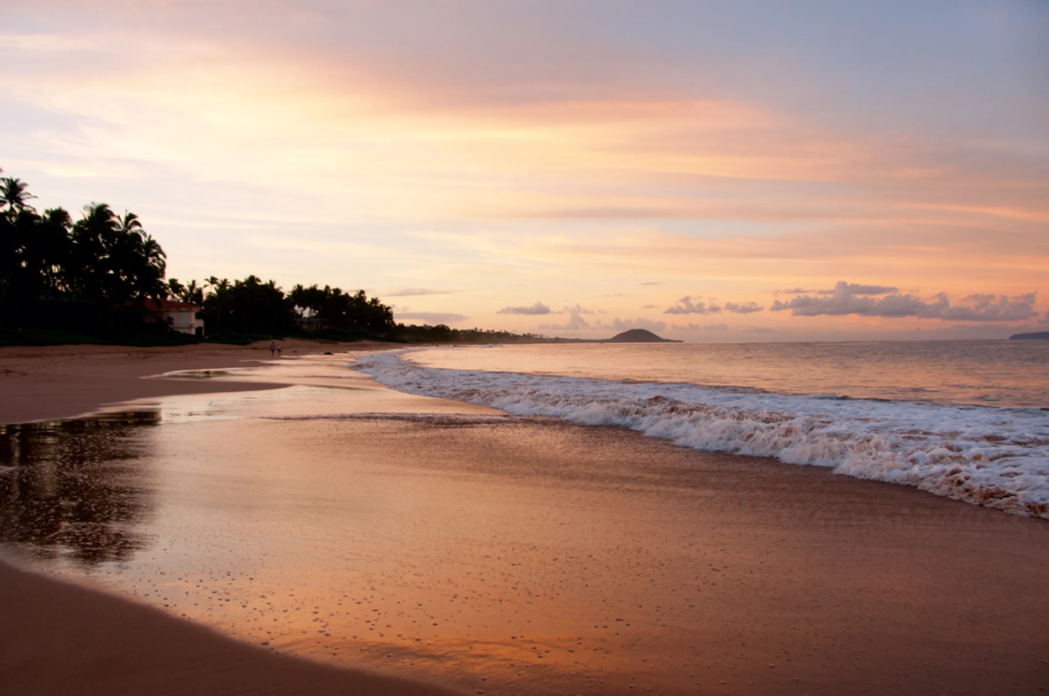 Stand-up paddleboarding in Wailea's calm turquoise waters