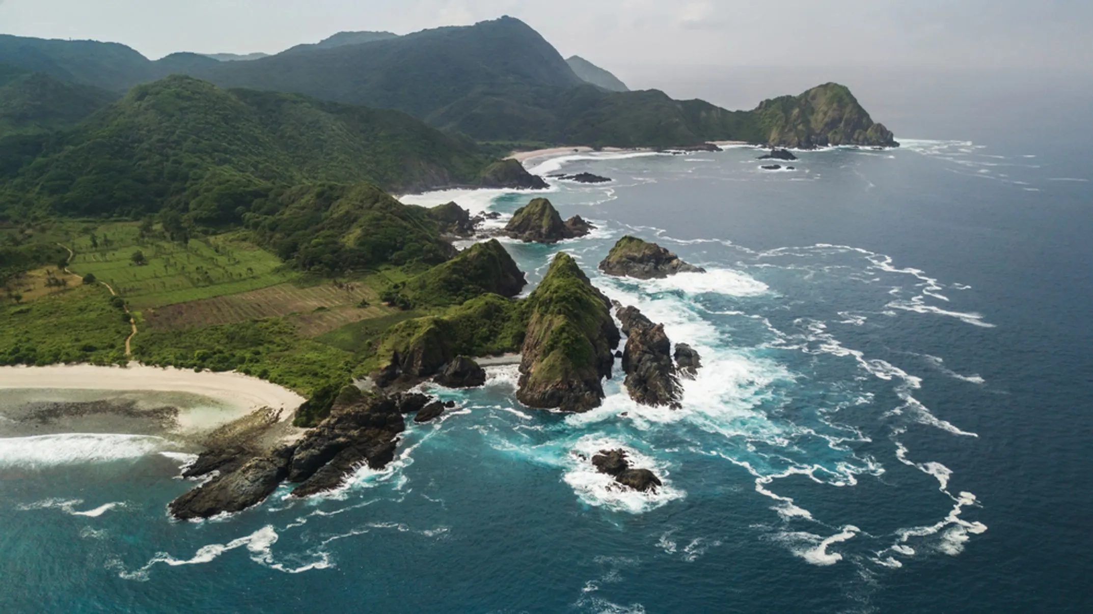 Professional helicopter pilot conducting pre-flight safety check in Kauai