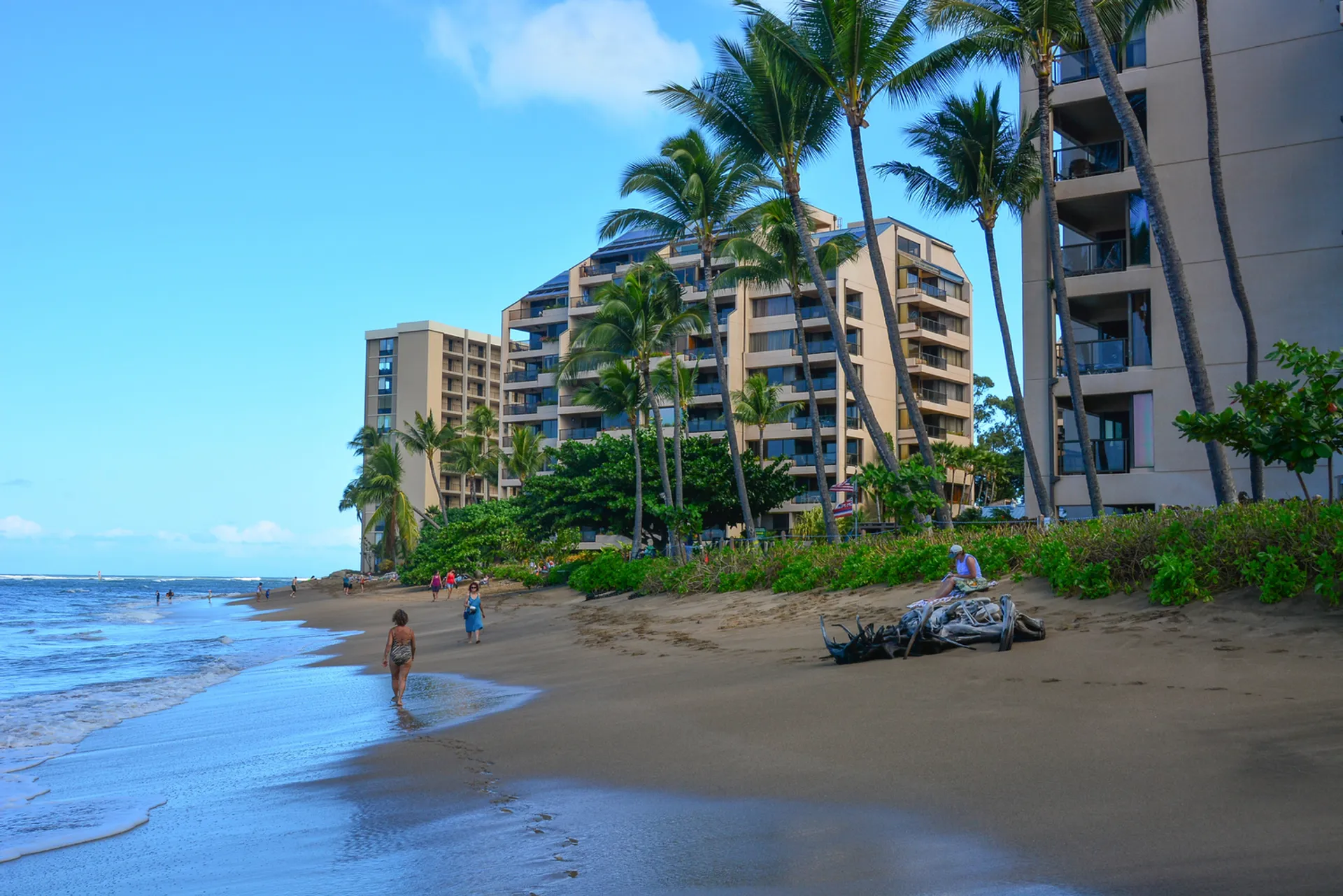 Aerial view of Waikiki Beach showing the new Renaissance Honolulu Hotel & Spa rising above Ala Moana Center with Diamond Head in the background during golden hour