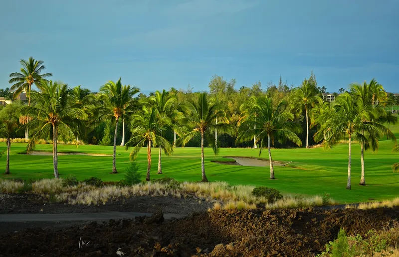 Big Island golf course with volcanic landscape and ocean views