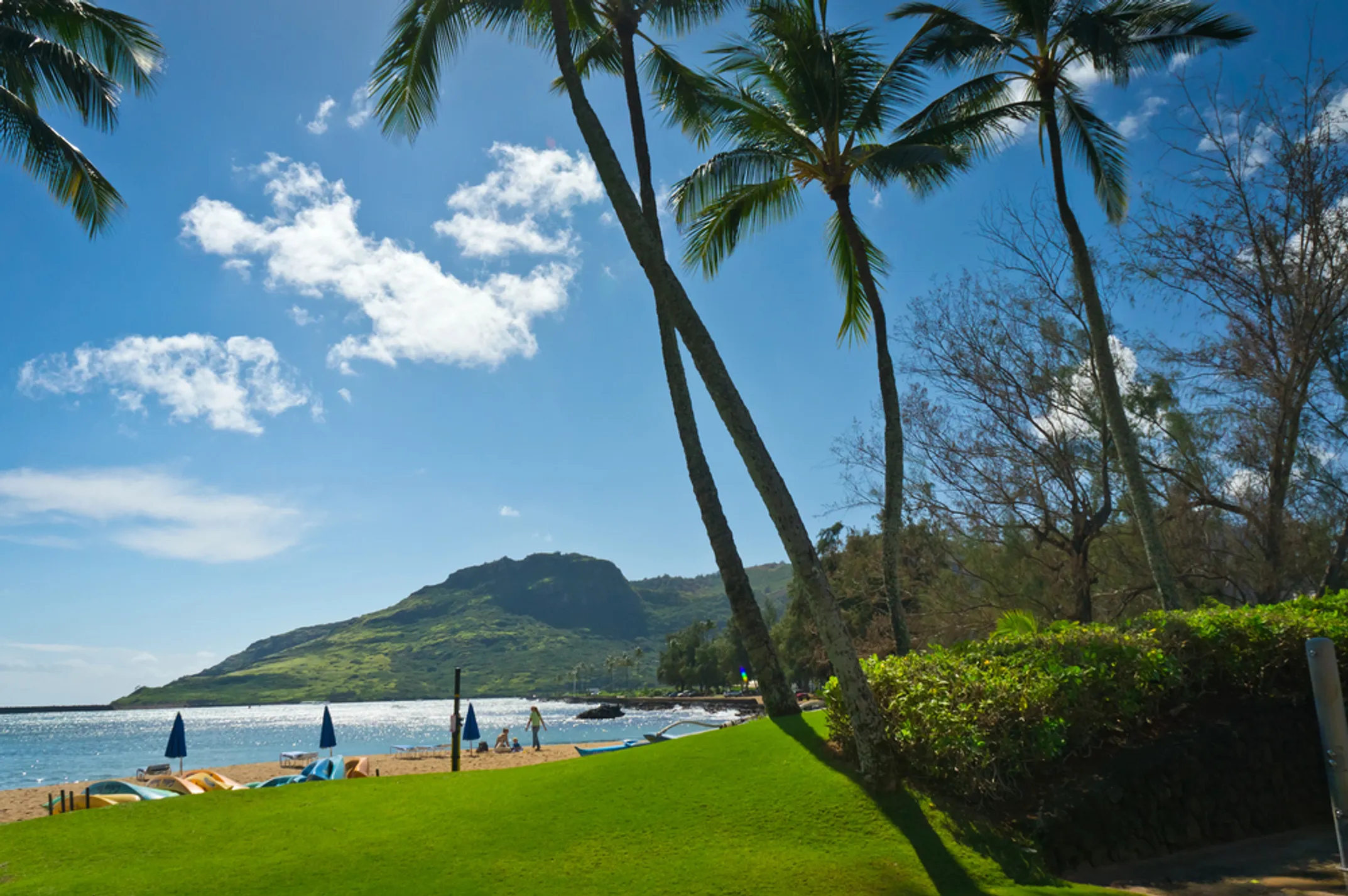 Scenic golf course on Kauai with ocean and mountains