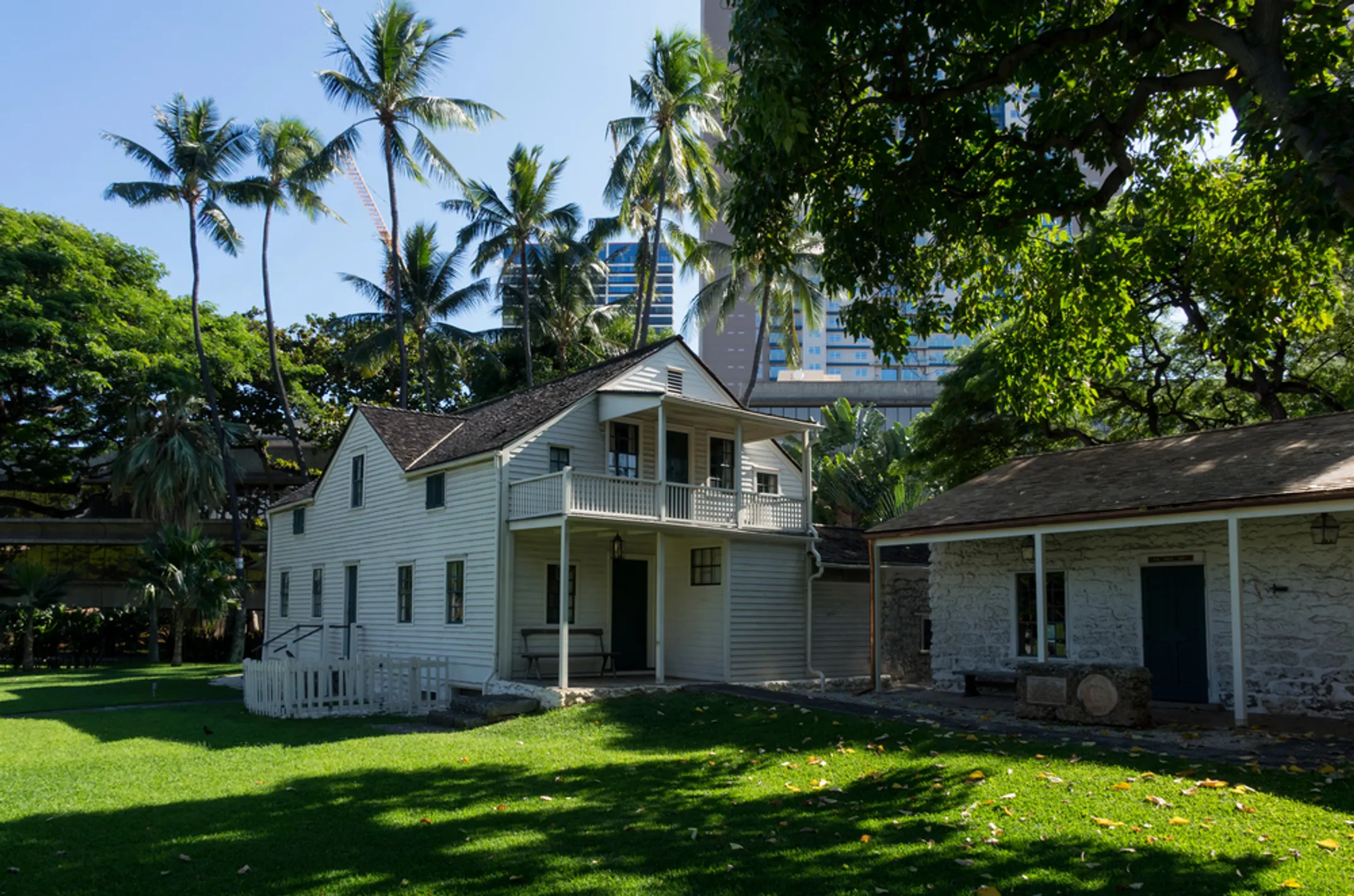 Historic Kauai museum building with lush tropical vegetation