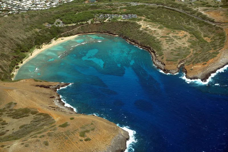 Aerial view of Hanauma Bay showing the distinctive curved bay and vibrant coral reef