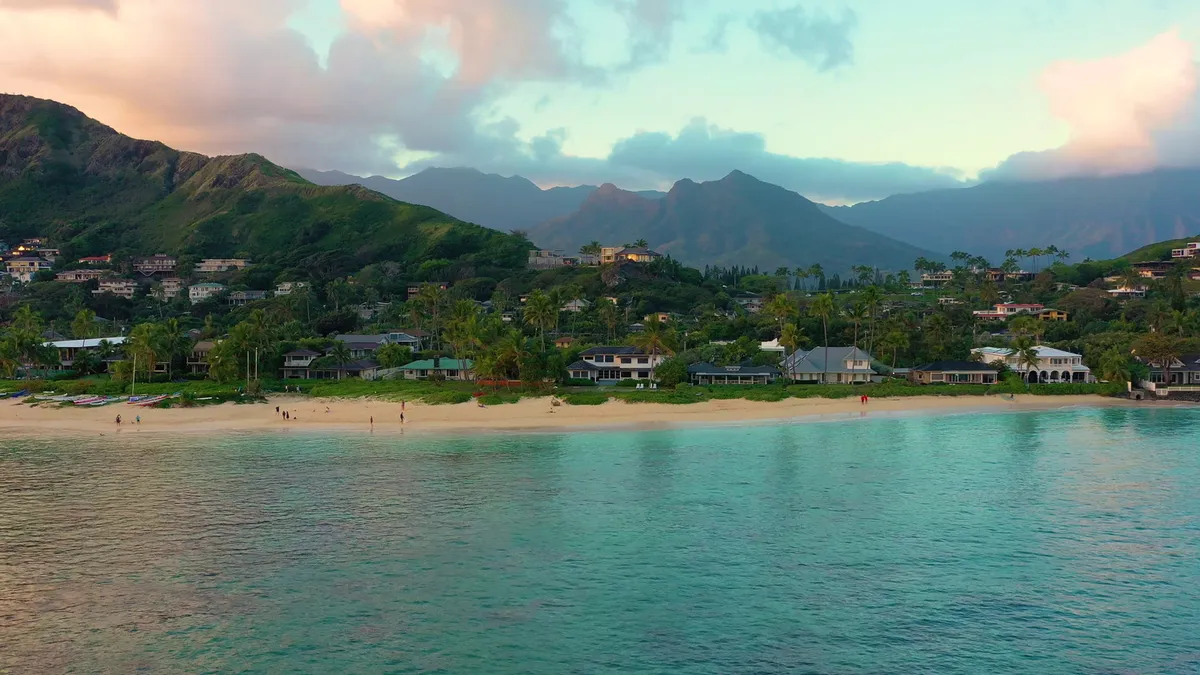 Aerial view of the Mokulua Islands at sunset in Kailua Bay, Oahu, Hawaii