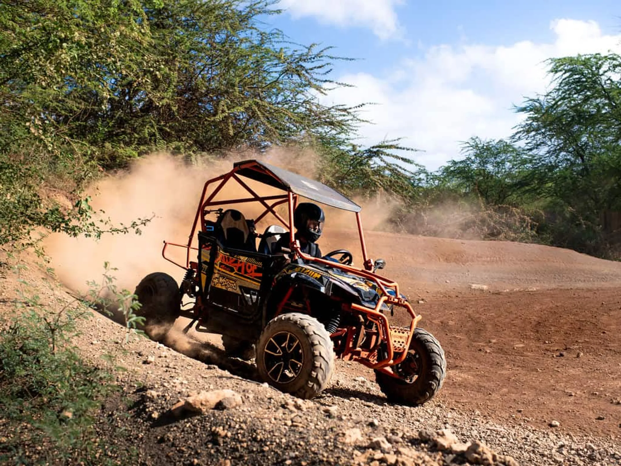 Coral Crater Adventure Park ATV tour with lush Hawaiian landscape