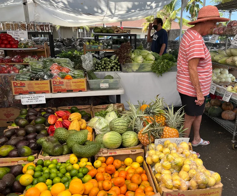 Vibrant display of Hawaiian tropical fruits at farmers market