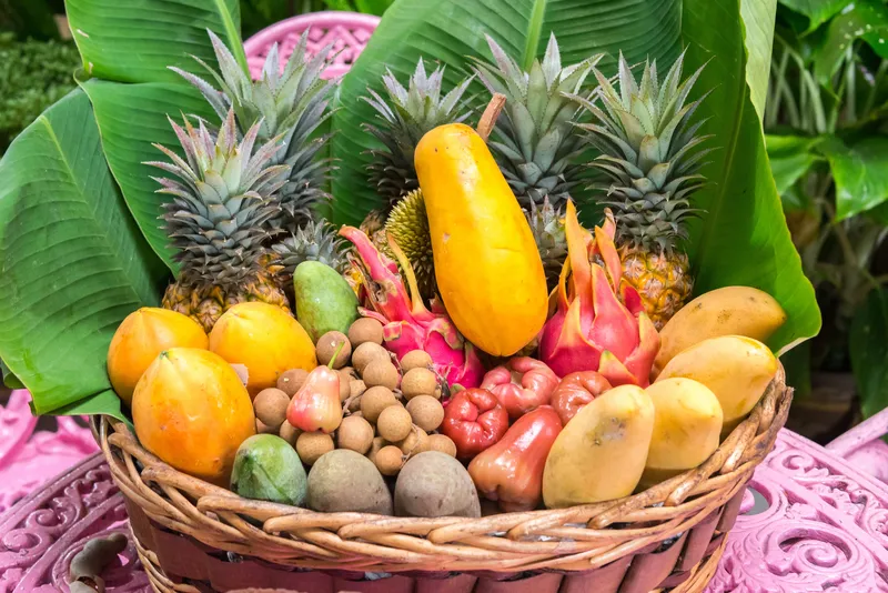 Beautiful display of Hawaiian tropical fruits - lilikoi, dragon fruit, rambutans, lychees