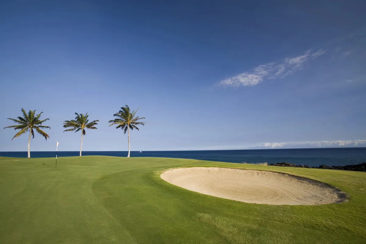 Big Island volcanic golf course with dramatic lava landscape