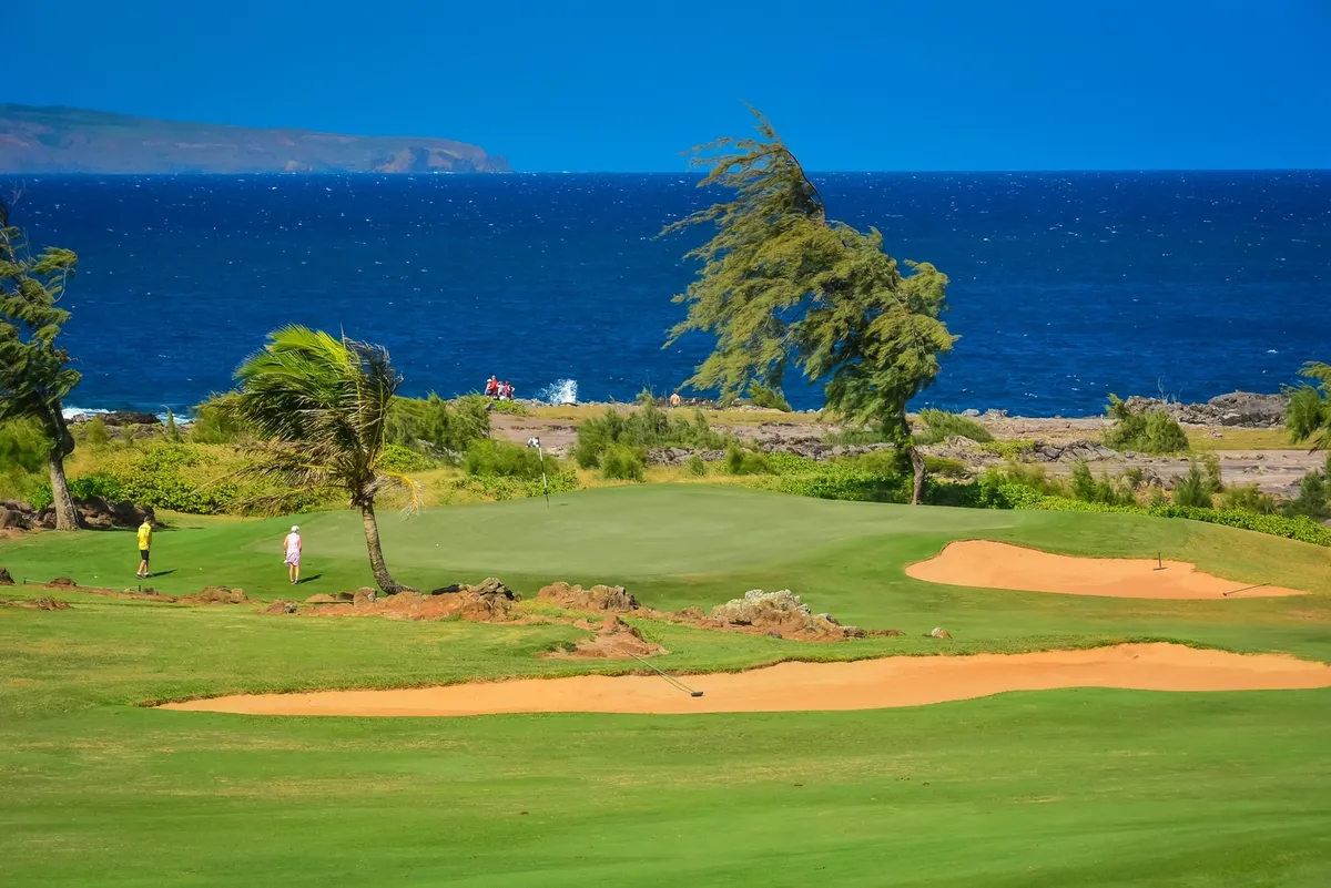 Dramatic neighbor island golf course showcasing luxury and natural beauty