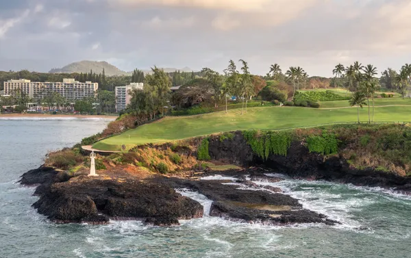 Ocean Course Hokuala dramatic seaside holes with cliffs and Pacific Ocean waves