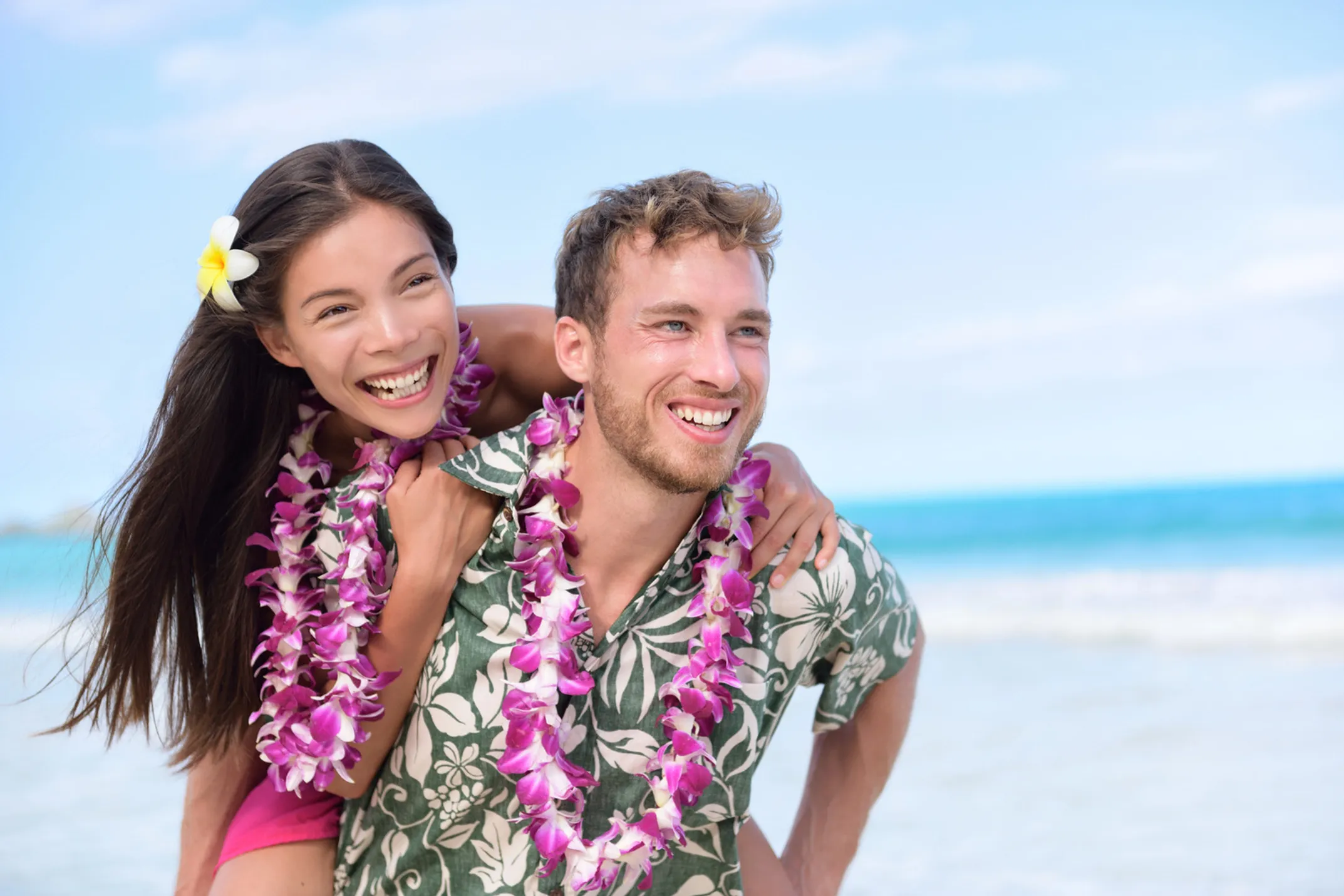 Romantic couple enjoying sunset in Hawaii