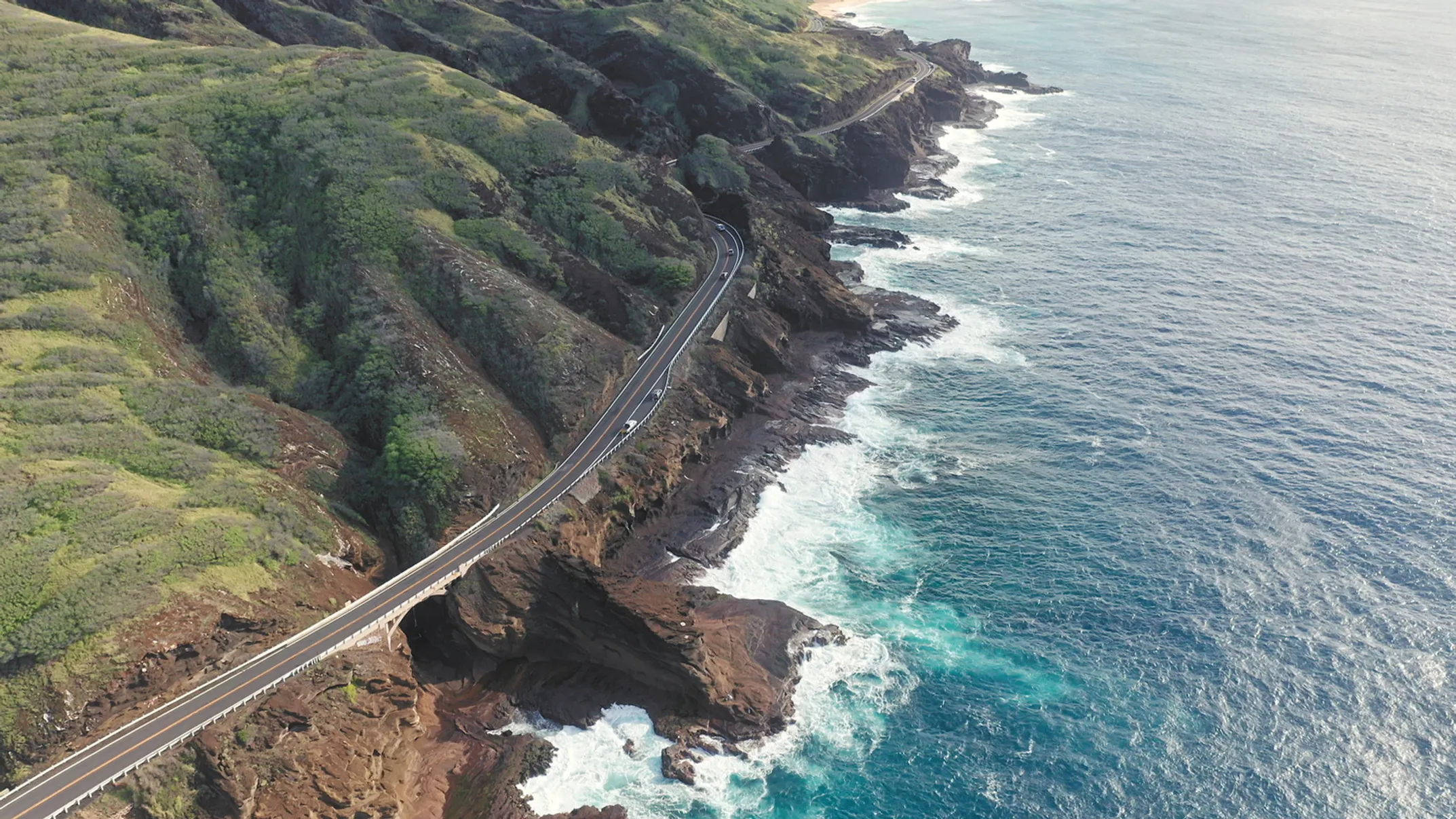 Oahu's scenic coastal drive with mountains and beaches