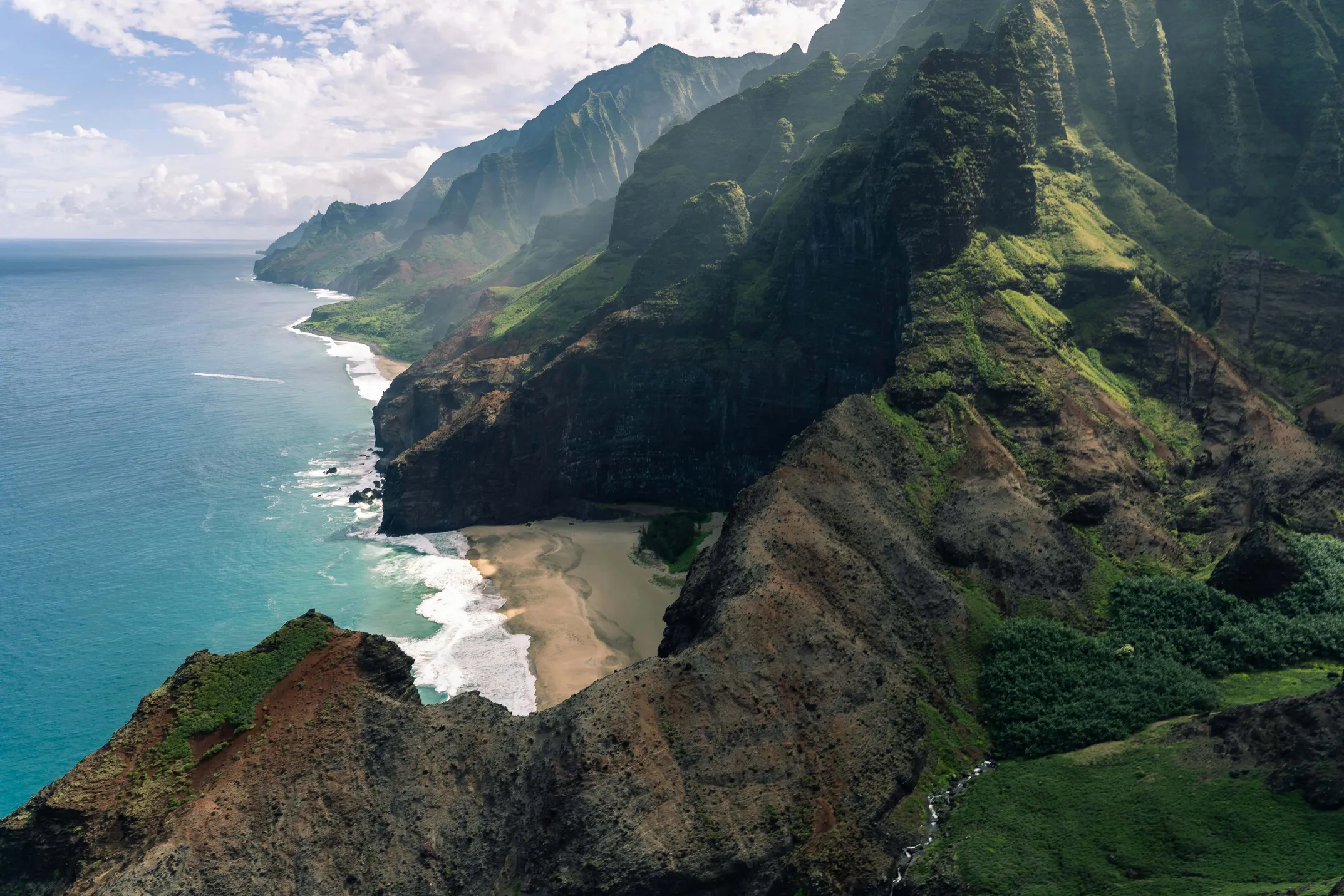 Kauai's dramatic Napali Coast with emerald cliffs