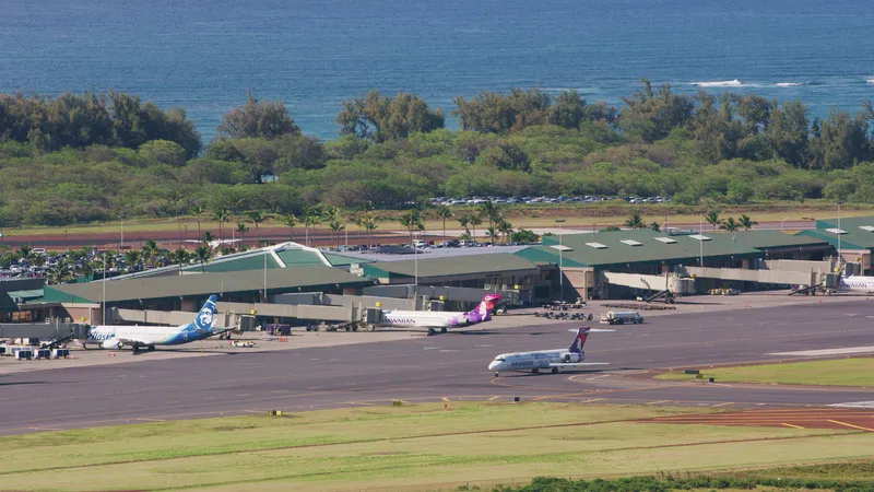 Aerial view of Kahului Airport on Maui showing the main terminal and runway areas