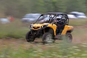 Muddy ATV rider having fun