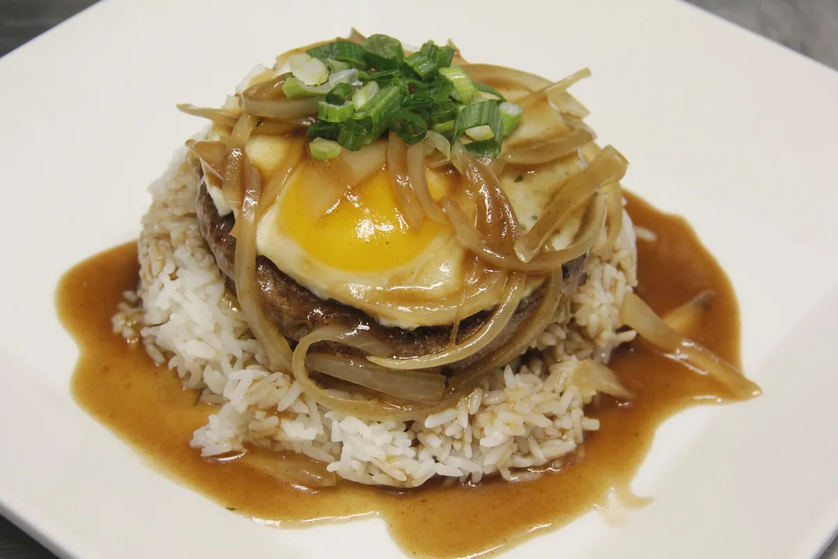 Modern Hawaiian cuisine featuring elevated loco moco with perfectly executed presentation and local ingredients