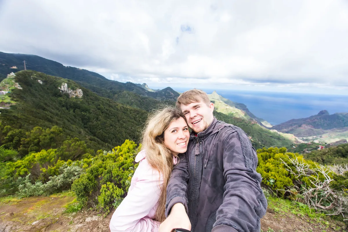 Visitors enjoying Hawaii's scenic viewpoints responsibly
