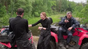 Small group of ATV riders with guide